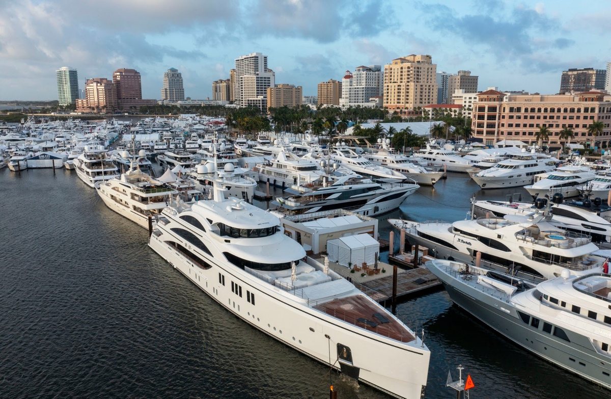 Superyachts lined up at a South Florida boat show marina